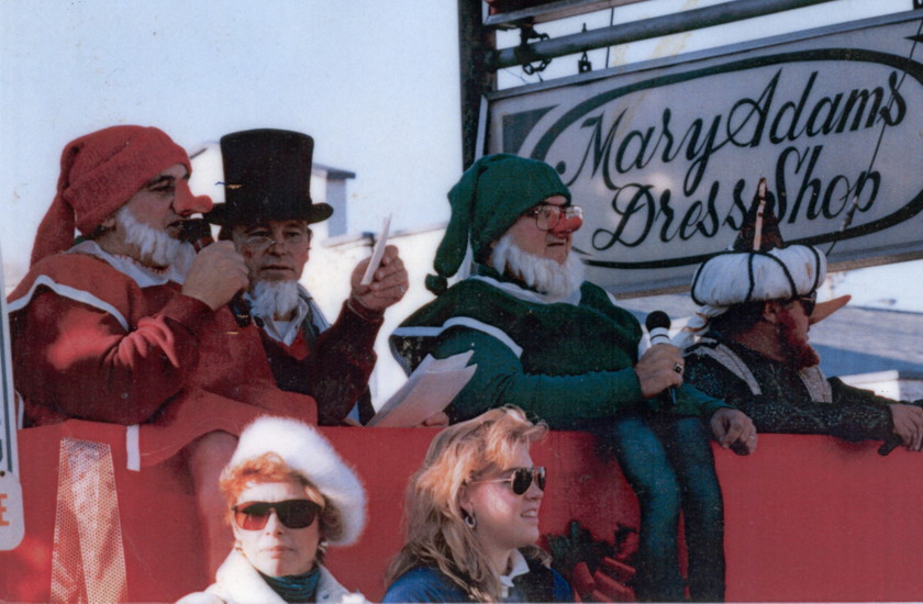 Charles Dickens and the Elves emcee the parade.